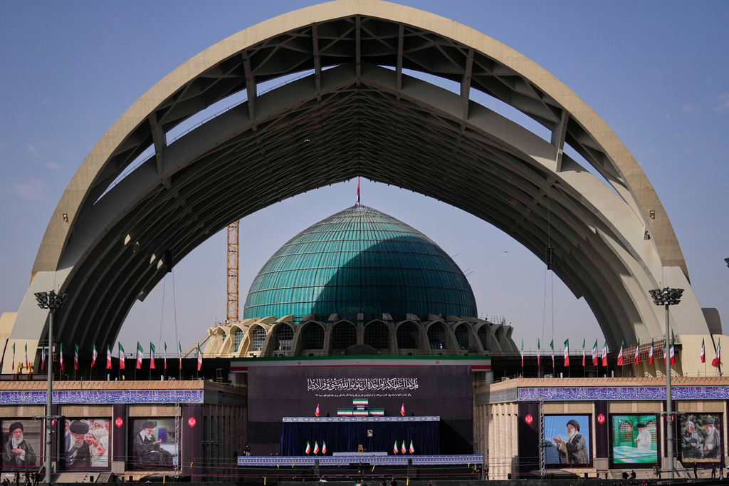 The coffins of the late Iranian Supreme Leader Ayatollah Ali Khamenei and members of his family are displayed on a stand at the start of the dayslong funeral ceremonies at the Imam Khomeini Mosalla Grand Mosque in Tehran, Iran, Saturday, July 4, 2026. (AP Photo/Altaf Qadri)