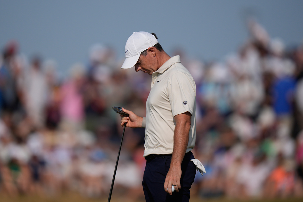 Rory McIlroy of Northern Ireland looks at his club after putting on the 9th green during the first day of the British Open Golf championships at Royal Birkdale golf club, in Southport, England, Thursday, July 16, 2026. (AP Photo/David Goldman)