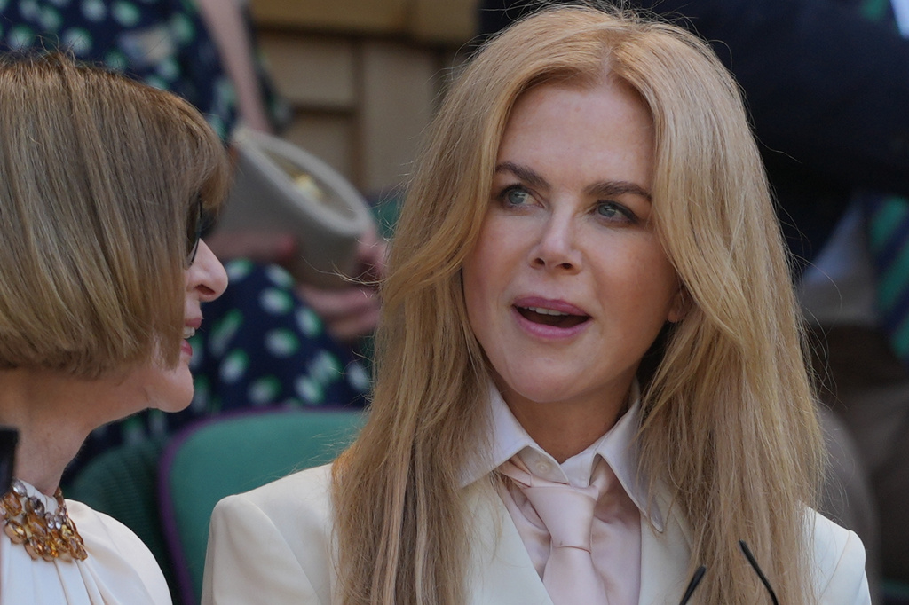 Actor Nicole Kidman, right, and fashion editor Anna Wintour watche play in the women's doubles final at Wimbledon Tennis Championships in London, Sunday, July 12, 2026. (AP Photo/Kin Cheung)