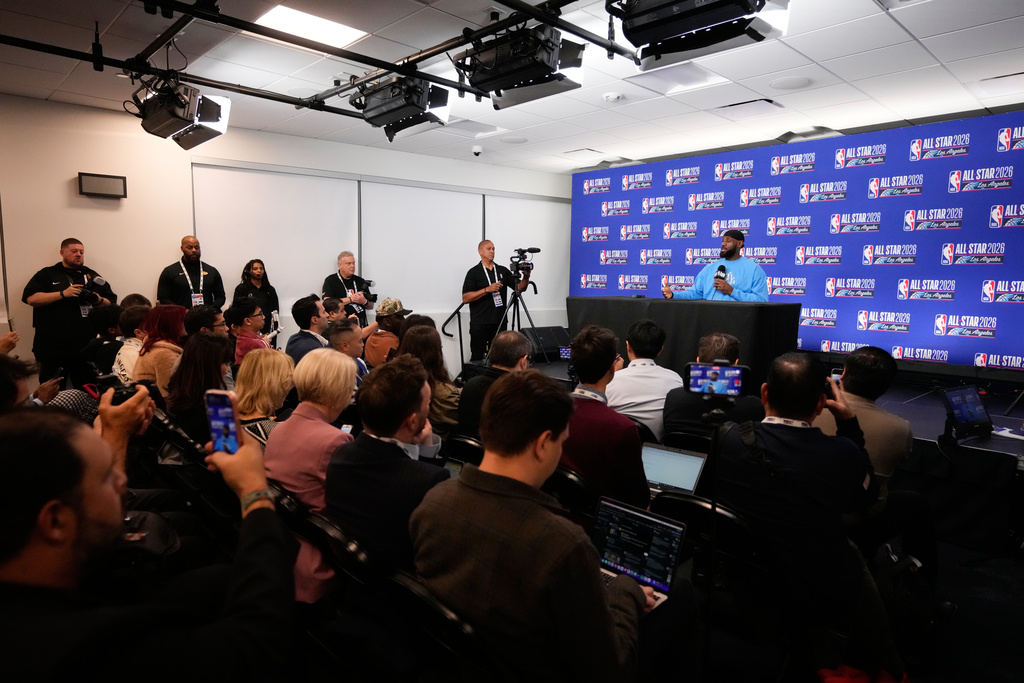 USA Stripes forward LeBron James (23) answers questions before the NBA All-Star basketball game Sunday, Feb. 15, 2026, in Inglewood, Calif. (AP Photo/Mark J. Terrill)