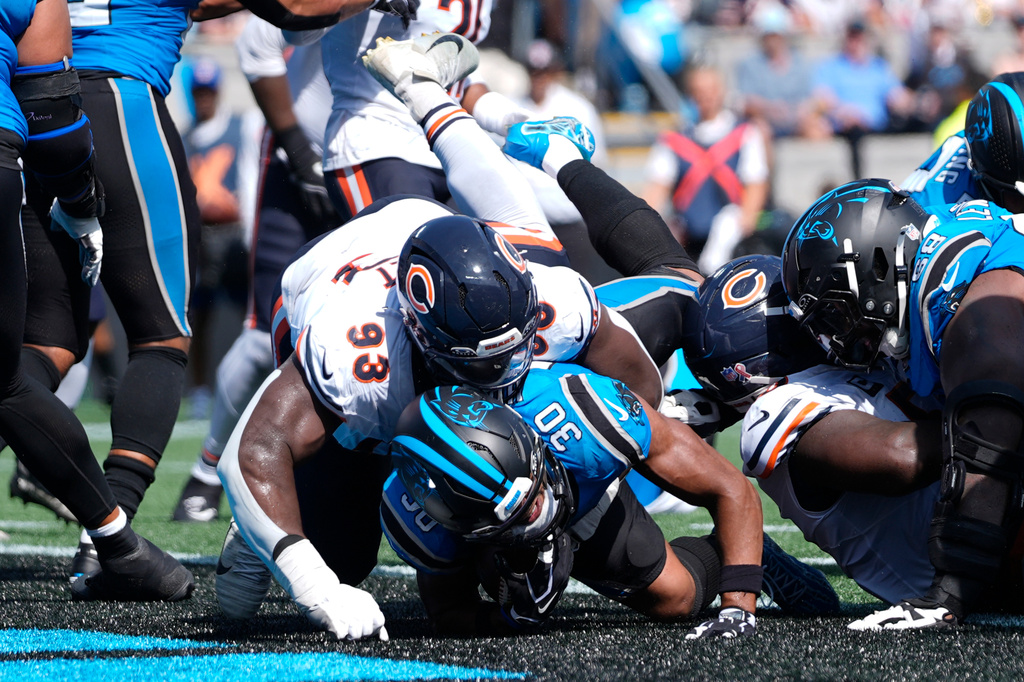 Carolina Panthers running back Chuba Hubbard (30) scores a touchdown during the second half of an NFL football game, Sunday, Sept. 13, 2026, in Charlotte, N.C. (AP Photo/Erik Verduzco)