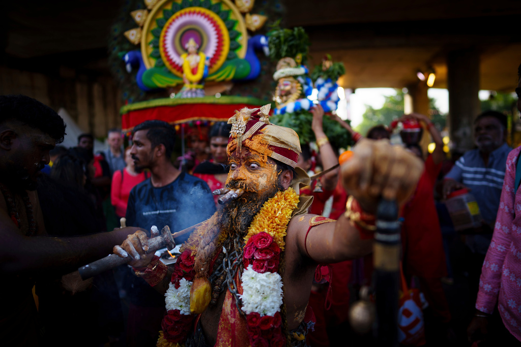 A Tamil Hindu priest takes part in a procession during the Thaipusam festival at Batu Caves, on the outskirts of Kuala Lumpur, Malaysia, Feb. 11, 2025. (AP Photo/Vincent Thian, File)