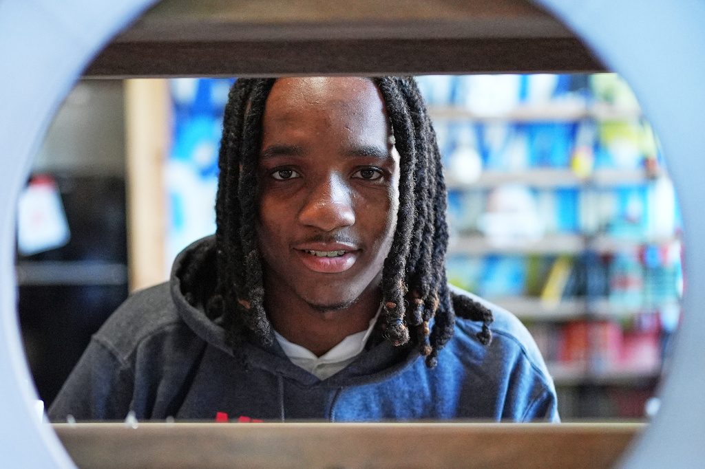 Damarion Spann poses for a portrait in Chicago, Monday, July 13, 2026. (AP Photo/Nam Y. Huh)