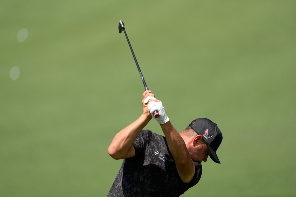 Gary Woodland warms up on the driving range before a practice round ahead of the Masters golf tournament at the Augusta National Golf Club, Tuesday, April 7, 2026, in Augusta, Ga. (AP Photo/Ashley Landis)