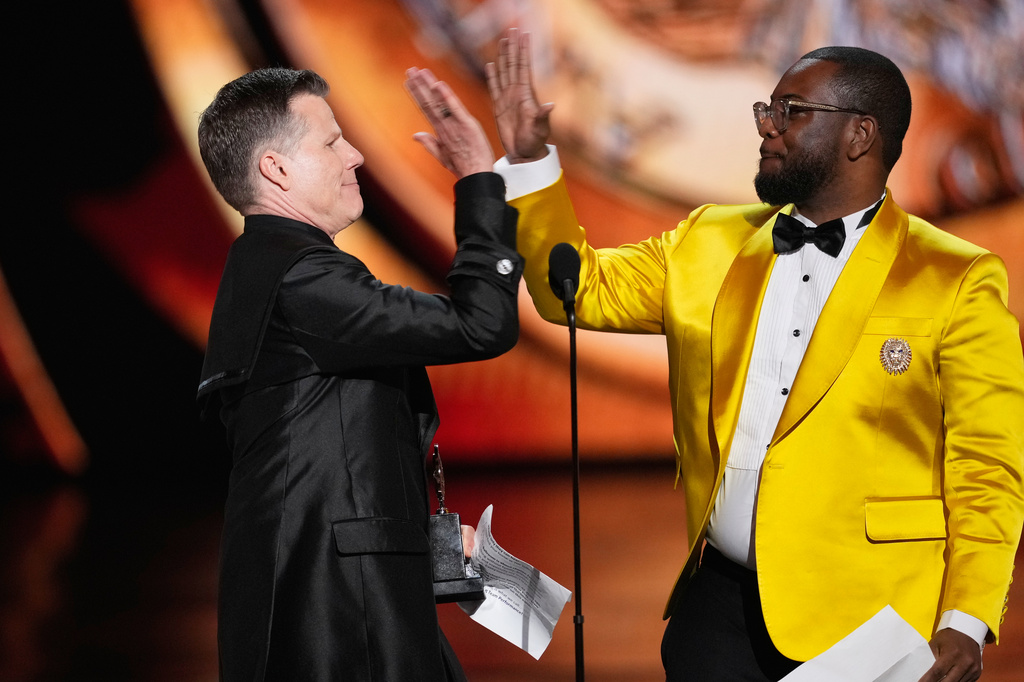 Bill Rauch, left, and Zhailon Levingston accept the award for best direction of a musical for "Cats: The Jellicle Ball" during the 79th Tony Awards on Sunday, June 7, 2026, at Radio City Music Hall in New York. (Photo by Charles Sykes/Invision/AP)