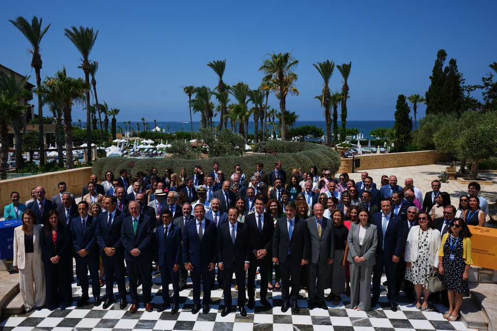 Cyprus' President Nikos Christodoulides, center, Malta's Prime Minister Robert Abela, center left, pose for a family photo during the high-level conference "Strengthening Islands and Coastal Communities of the European Union" in the southwestern coastal city of Paphos on the eastern Mediterranean island of Cyprus, Friday, June 26, 2026. (AP Photo/Petros Karadjias)