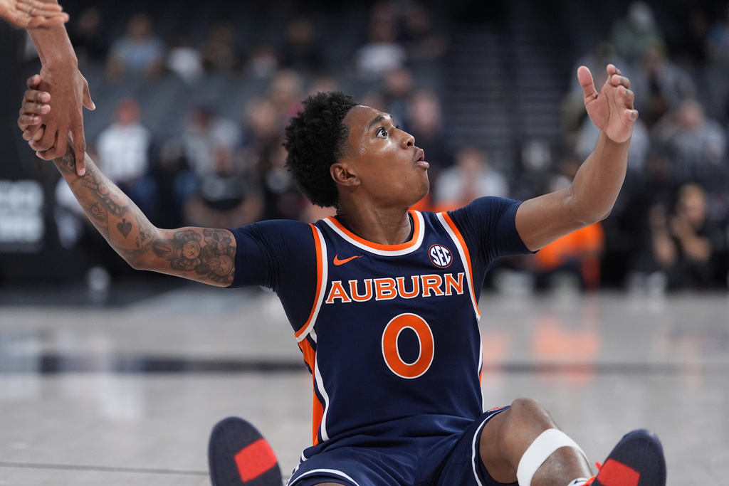 Auburn guard Tahaad Pettiford (0) reacts to a call during the first half of an NCAA college basketball game against Oregon in Las Vegas, Monday, Nov. 24, 2025. (AP Photo/Eric Gay)