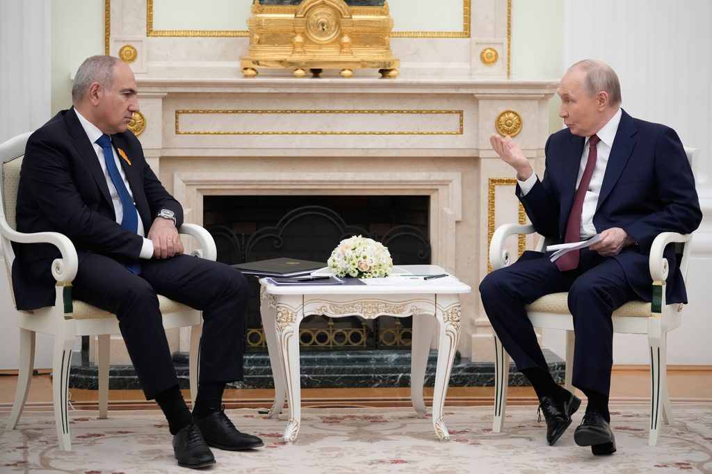 FILE - Russian President Vladimir Putin, right, and Armenian Prime Minister Nikol Pashinyan talk during their meeting at the Kremlin in Moscow, Russia, on April 1, 2026. (AP Photo/Pavel Bednyakov, Pool, File)