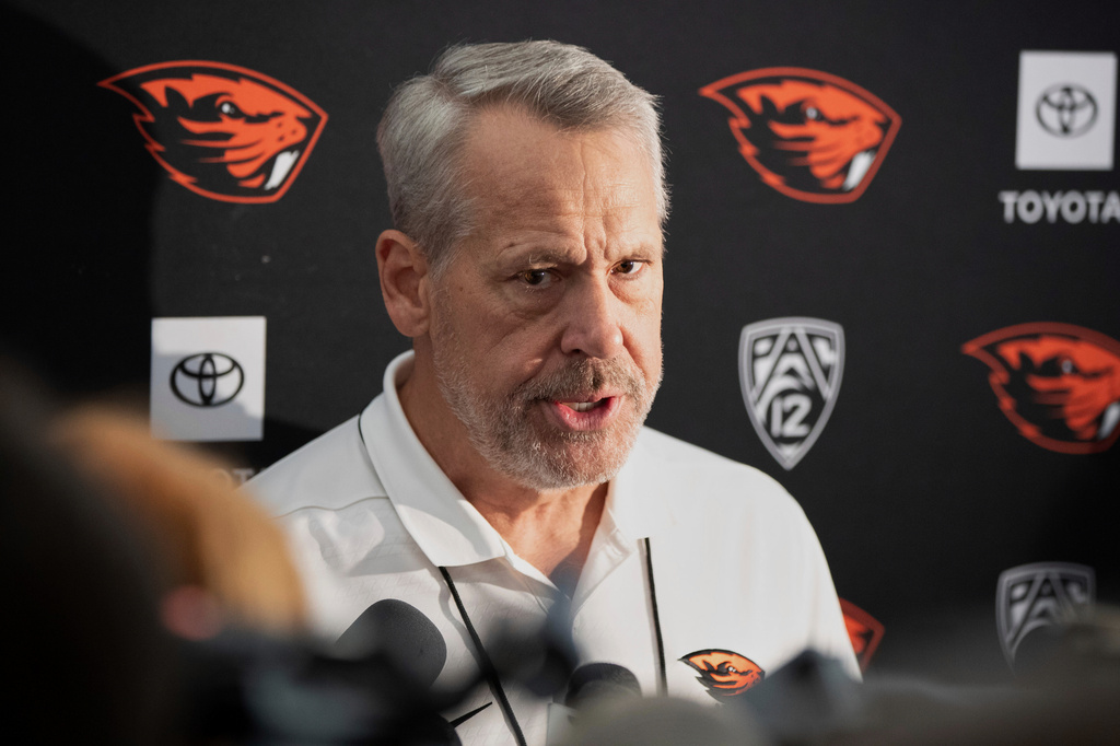 FILE - Oregon State athletic director Scott Barnes talks with press before an NCAA football game against Oregon, Sept. 14, 2024, in Corvallis, Ore. (AP Photo/Amanda Loman, File)