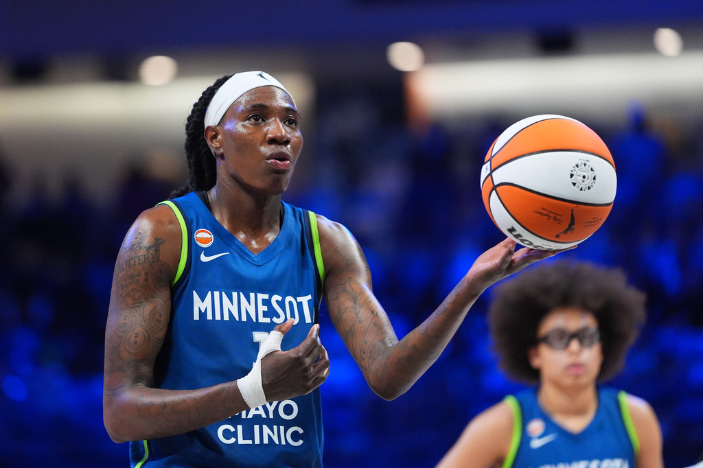 Minnesota Lynx forward Natasha Howard prepares for a free throw during the second half of a WNBA basketball game against the Dallas Wings in Arlington, Texas, Thursday, May 14, 2026. (AP Photo/LM Otero)