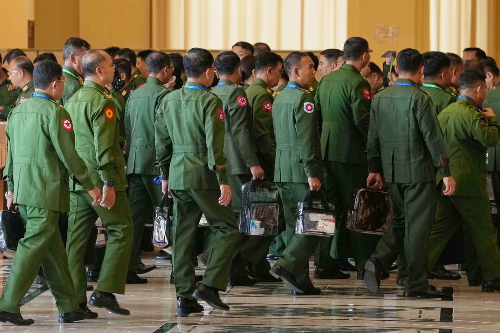 Myanmar's military representatives arrive for a session at Union parliament in Naypyitaw, Myanmar, Thursday, April 2, 2026. (AP Photo/Aung Shine Oo)