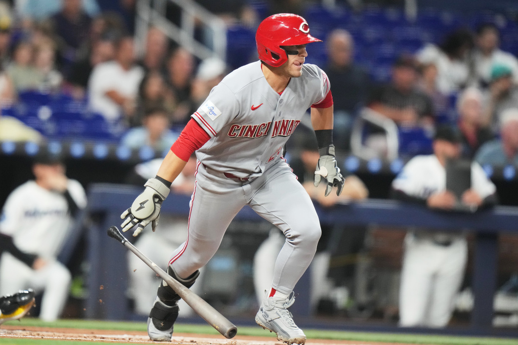 Cincinnati Reds' TJ Friedl runs after hitting a single during the first inning of a baseball game against the Miami Marlins, Monday, April 6, 2026, in Miami. (AP Photo/Lynne Sladky)
