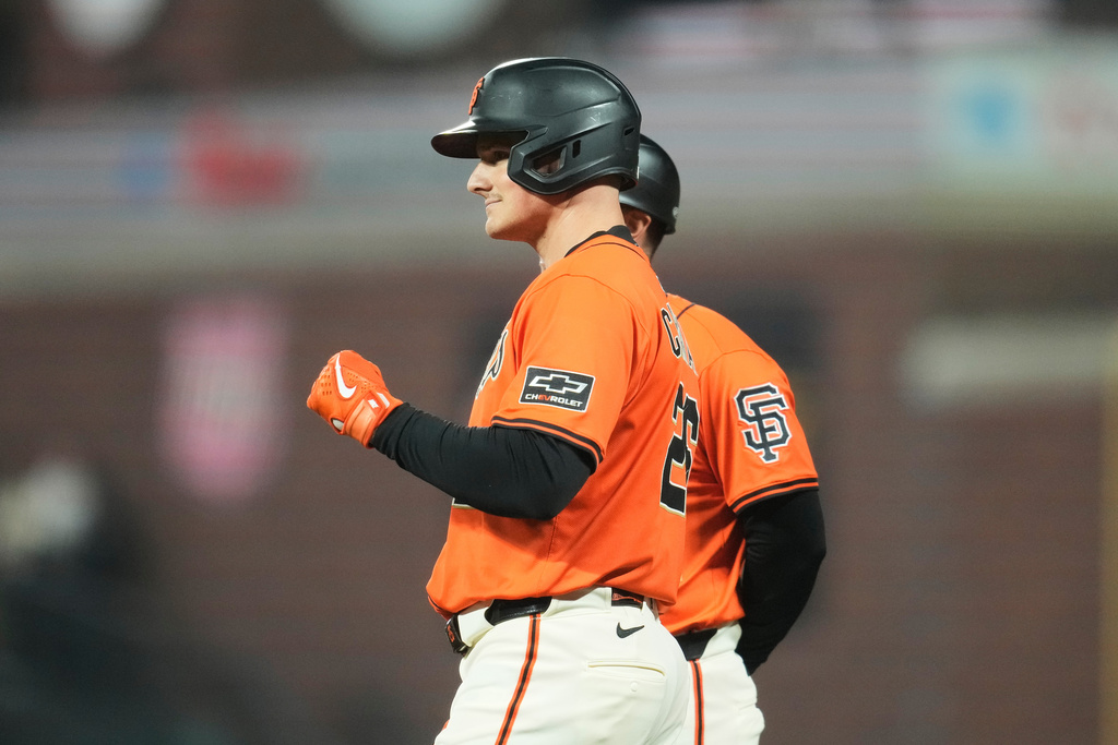 San Francisco Giants' Matt Chapman gestures after hitting a single against the Colorado Rockies during the fifth inning of a baseball game in San Francisco, Friday, Sept. 26, 2025. (AP Photo/Jeff Chiu)
