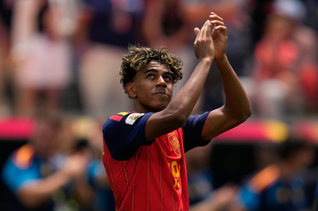Spain's Lamine Yamal (19) celebrates at the end of the World Cup quarterfinal soccer match between Spain and Belgium in Inglewood, Calif., near Los Angeles, Friday, July 10, 2026. (AP Photo/Gregory Bull)