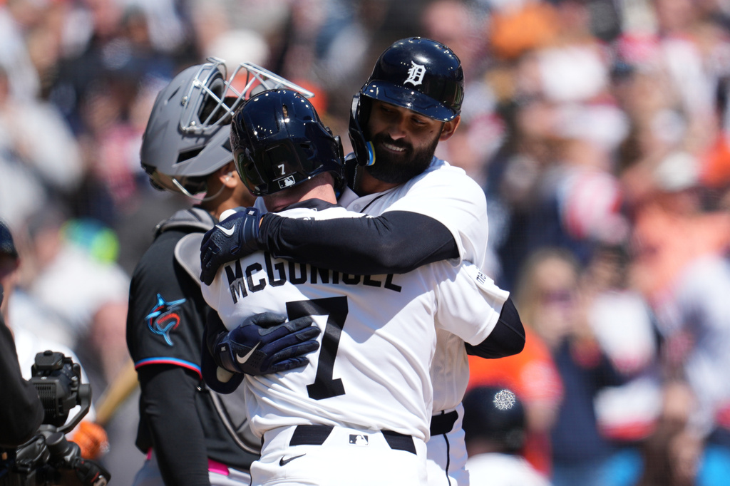 Detroit Tigers' Riley Greene celebrates his three-run home run with Kevin McGonigle (7) against the Miami Marlins during the third inning of a baseball game Saturday, April 11, 2026, in Detroit. (AP Photo/Paul Sancya)