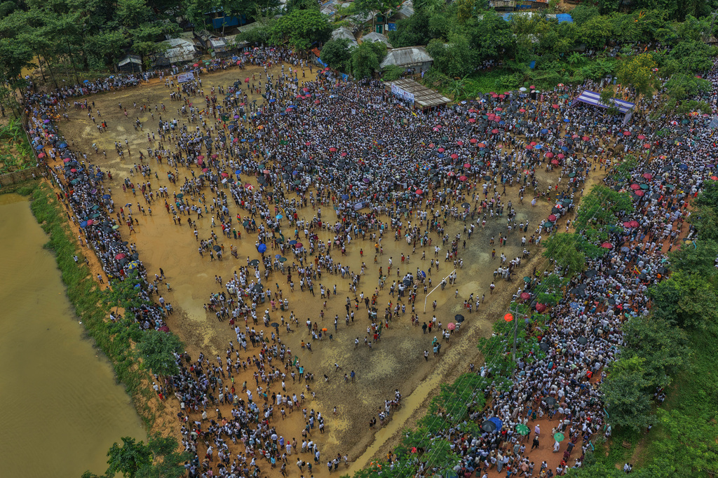 Rohingyas gather during an event at a refugee camp in Cox's Bazar, Bangladesh, Tuesday, Aug. 25, 2026, marking the anniversary of the their exodus. (AP Photo/Abdul Goni)