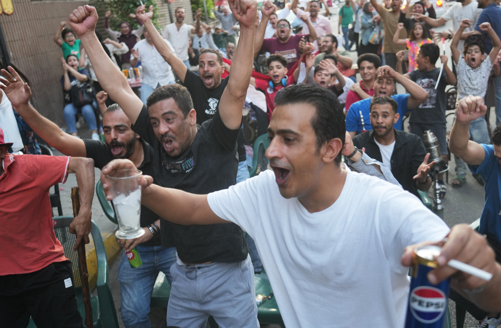 Fans celebrate Egypt's goal on Argentina during a watch party for the World Cup knockout stage, in Cairo, Egypt, Tuesday, July 7, 2026. (AP Photo/Amr Nabil)