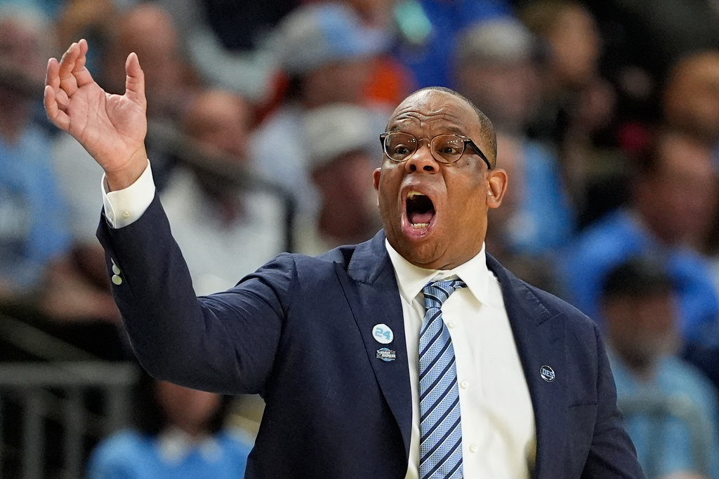 North Carolina head coach Hubert Davis yells during the second half against VCU in the first round of the NCAA college basketball tournament, Thursday, March 19, 2026, in Greenville, S.C. (AP Photo/Chris Carlson)