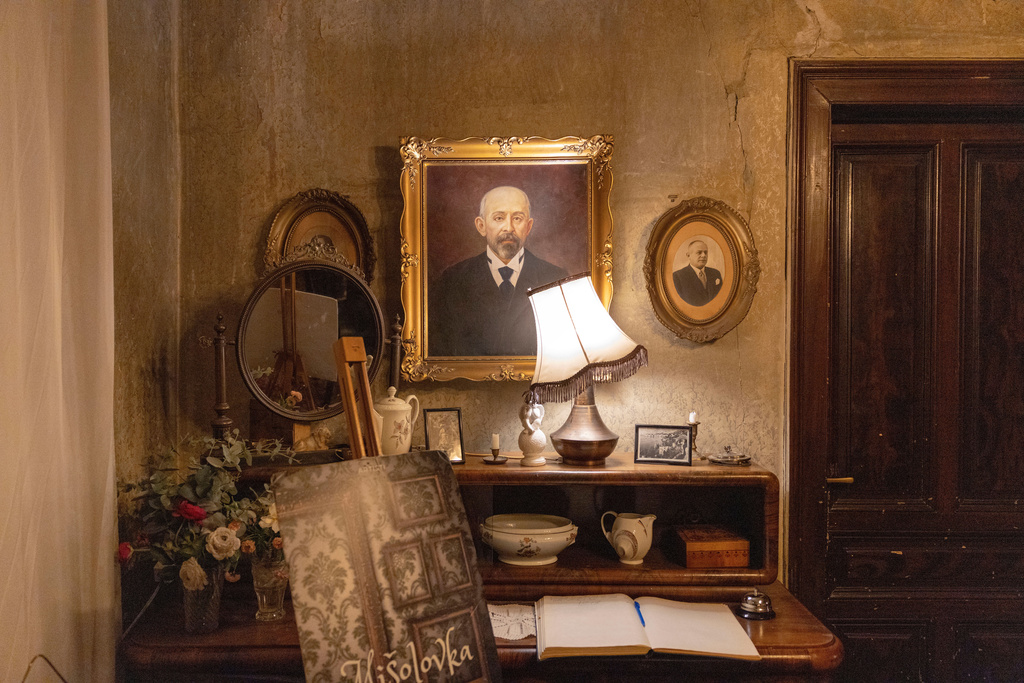 Pieces of furniture and portraits are seen in an old villa used for theater performances by an independent theater production, in Belgrade, Serbia, Sunday, Jan. 18, 2026. (AP Photo/Marko Drobnjakovic)