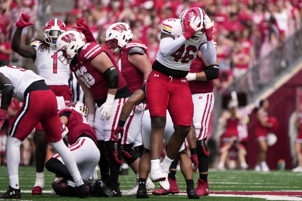 Maryland defensive lineman Dillan Fontus reacts after sacing Wisconsin quarterback Danny O'Neil during the first half of an NCAA college football game Saturday, Sept. 20, 2025, in Madison, Wis. (AP Photo/Morry Gash)