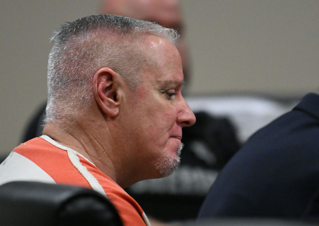 Colin Gray, father of the Apalachee High School shooter Colt Gray, reacts as he sits with his attorneys during his sentencing hearing at Barrow County Superior Court on Thursday, July 30, 2026, in Winder, Ga. (Hyosub Shin/Atlanta Journal-Constitution via AP, Pool)