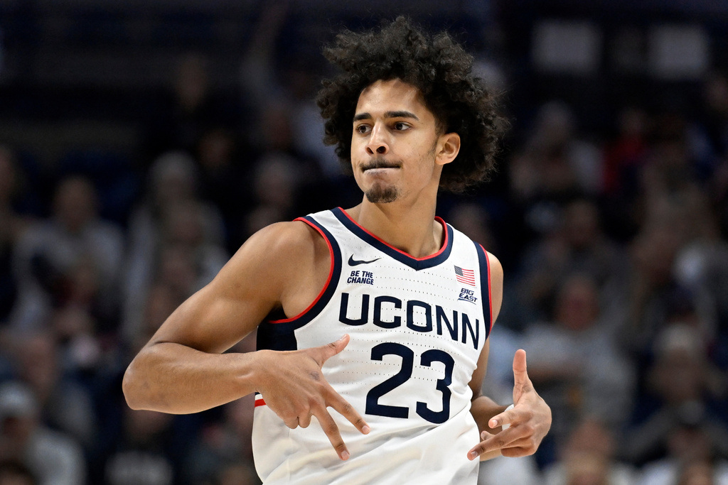 UConn forward Jayden Ross reacts after making a basket in the first half of an NCAA college basketball game against Columbia, Monday, Nov. 10, 2025, in Storrs, Conn. (AP Photo/Jessica Hill)