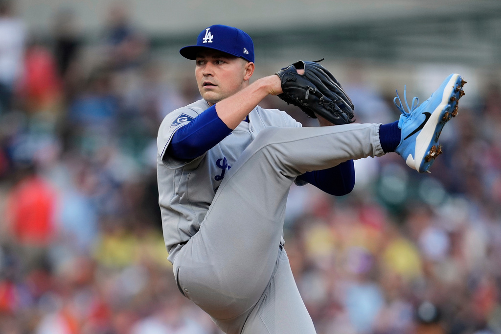 Los Angeles Dodgers pitcher Tarik Skubal throws against the Detroit Tigers during the first inning of a baseball game Friday, Aug. 28, 2026, in Detroit. (AP Photo/Paul Sancya)