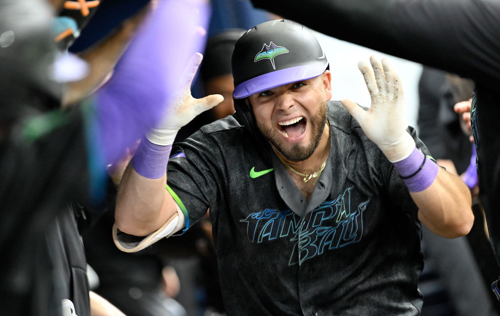Tampa Bay Rays Jonathan Aranda celebrates after his two-run home run during the fifth inning of a baseball game against the Arizona Diamondbacks, Saturday, June 27, 2026, in St. Petersburg, Fla. (AP Photo/Jason Behnken)