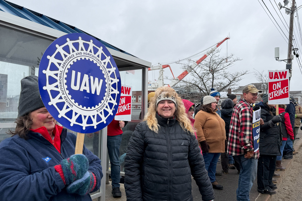 Strikers picketing outside Bath Iron Works in Bath, Maine, on Monday, May 23, 2026. (AP Photo/Rodrique Ngowi)