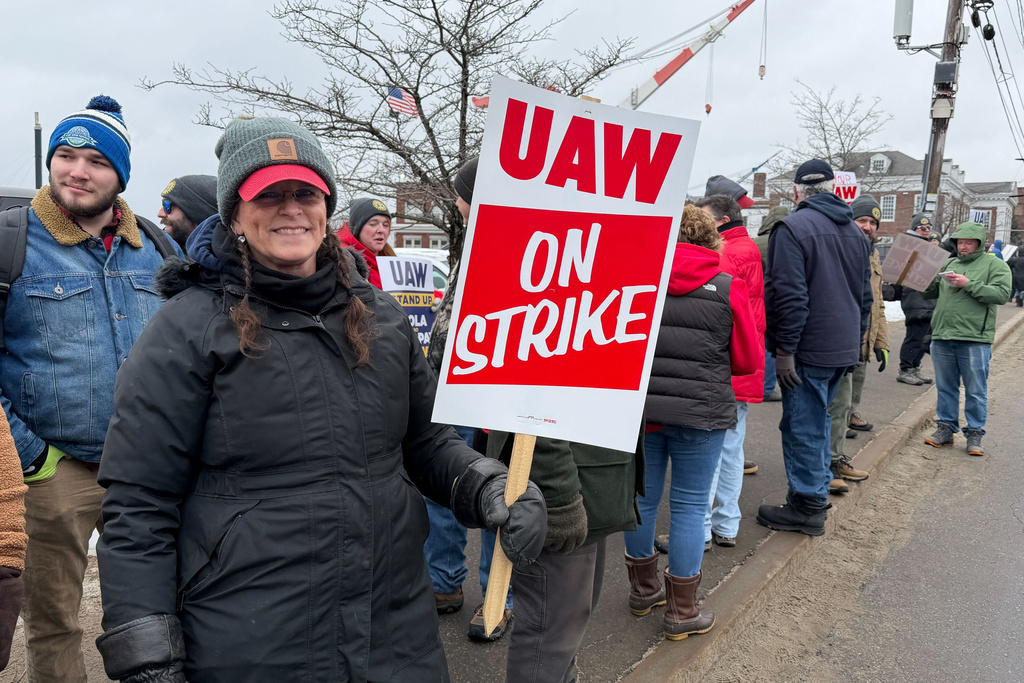 Strikers picketing outside Bath Iron Works in Bath, Maine, on Monday, May 23, 2026. (AP Photo/Rodrique Ngowi)