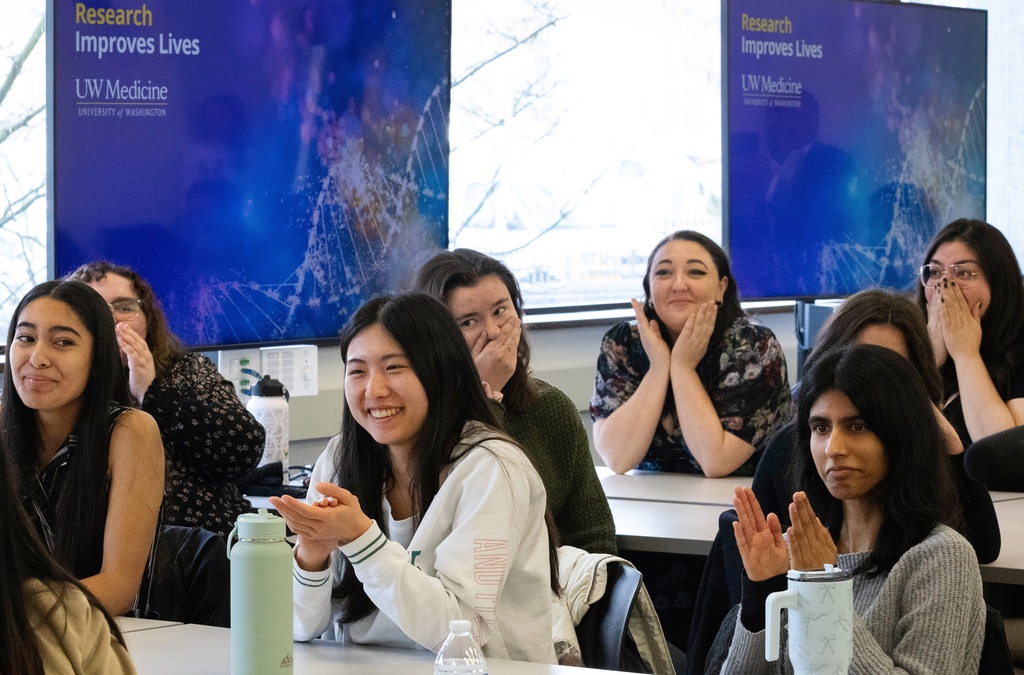 Seniors attending University of Washington's medical laboratory science undergraduate program react to an announcement that their tuition for their clinical rotations will be covered by a $50 million anonymous donation, Monday, Dec. 1, 2025, in Seattle. (Ken Lambert/The Seattle Times via AP)