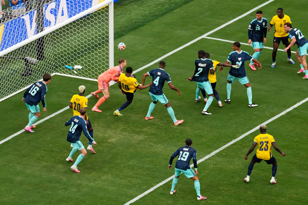 Ecuador's Gonzalo Plata (19) scores a go-ahead goal on Germany goalkeeper Manuel Neuer during the World Cup Group E soccer match in East Rutherford, N.J., near New York, Thursday, June 25, 2026. (AP Photo/Seth Wenig)