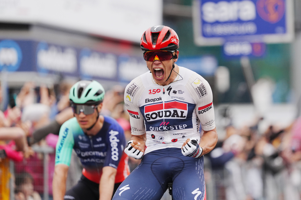 France's Paul Magnier celebrates winning stage 1 of the Giro d'Italia cycling race, from Nessebar to Burgas, Bulgaria, Friday, May 8, 2026. (Massimo Paolone/LaPresse via AP)