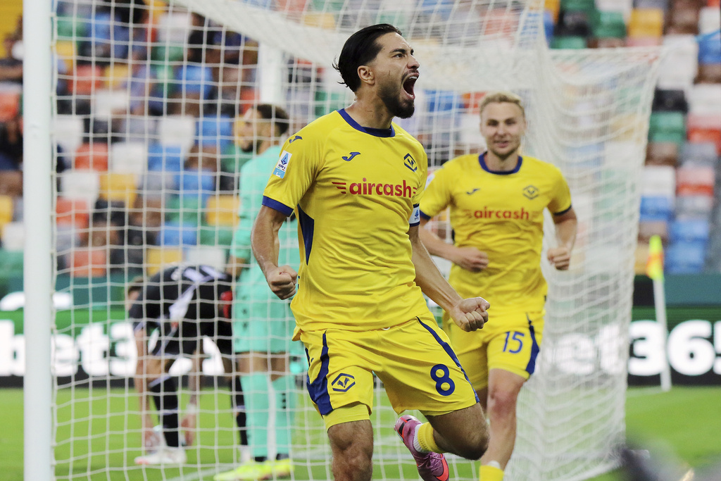 Verona's Suat Serdar celebrates scoring their side's first goal of the game during the Italian Serie A soccer match between Udinese and Hellas Verona at the Bluenergy Stadium in Udine, Italy, Monday, Aug. 25, 2025. (Andrea Bressanutti/LaPresse via AP)