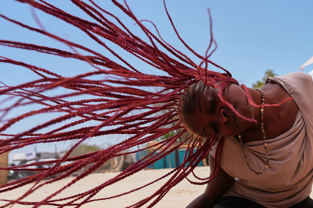 A lady attends a dance workshop at the Biennale of Dance in Africa, held at Ecole Des Sables in Toubab Dialaw, Senegal, Saturday, May 2, 2026. (AP Photo/Misper Apawu)