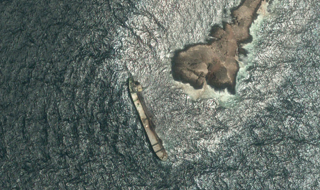 This satellite photo taken Wednesday Aug. 5, 2026, shows the tanker Caroline Bezengi, grounded and partly submerged off the coast of Oman, leaking crude oil into the sea. (Pléiades © CNES 2026, Distribution Airbus DS via AP)