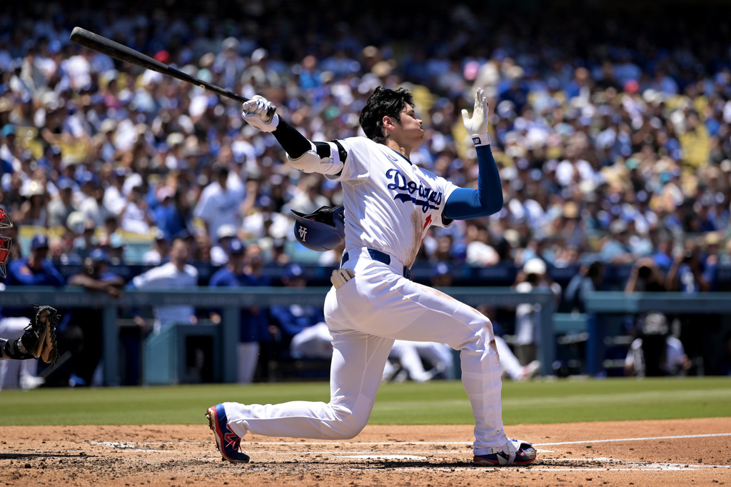 Los Angeles Dodgers' Shohei Ohtani strikes out during the second inning of a baseball game against the Philadelphia Phillies, Sunday, May 31, 2026, in Los Angeles. (AP Photo/Jayne Kamin-Oncea)