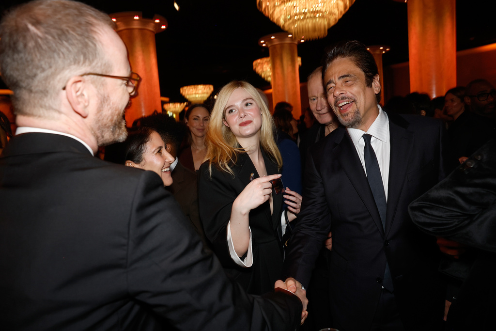 Joachim Trier, from left, Brittany Kahan, Elle Fanning, and Benicio Del Toro attend the 98th Academy Awards Oscar nominees luncheon on Tuesday, Feb. 10, 2026, at the Beverly Hilton Hotel in Beverly Hills, Calif. (Photo by Caroline Brehman/Invision/AP)