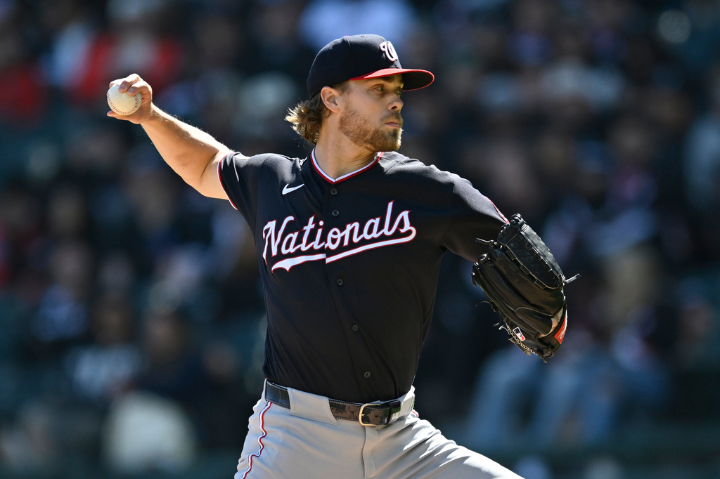Washington Nationals starter Jake Irvin delivers a pitch during the first inning of a baseball game against the Chicago White Sox in Chicago, Saturday, April 25, 2026. (AP Photo/Paul Beaty)