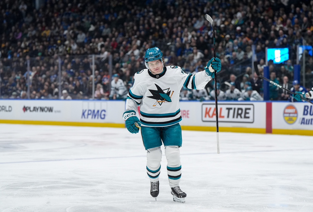 San Jose Sharks' Macklin Celebrini celebrates his goal against the Vancouver Canucks during the first period of an NHL hockey game in Vancouver, Tuesday, Jan. 27, 2026. (Darryl Dyck/The Canadian Press via AP)