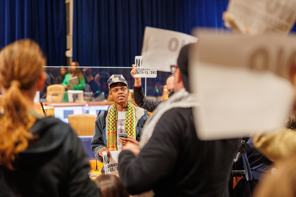 Protesters participate in an anti-ICE demonstration during a meeting at the City Hall in New Orleans, Thursday, Dec. 4, 2025. (Enan Chediak/The Times-Picayune/The New Orleans Advocate via AP)