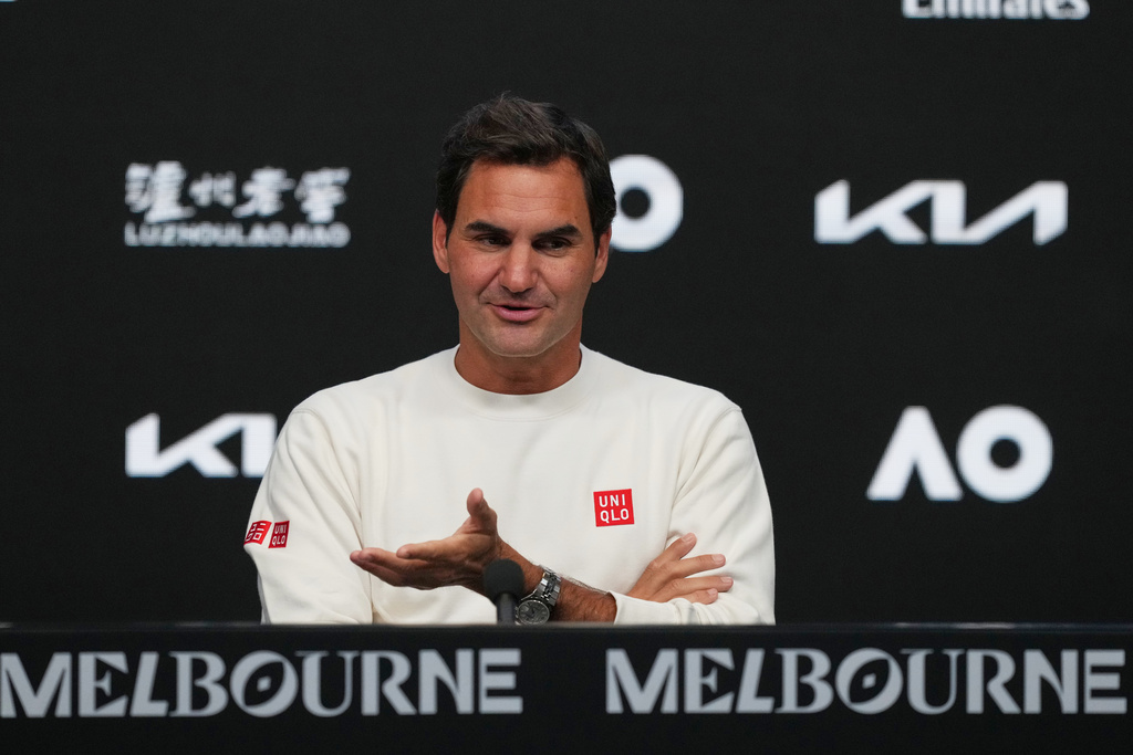 Roger Federer of Switzerland gestures during a press conference ahead of the Australian Open tennis championship in Melbourne, Australia, Thursday, Jan. 15, 2026. (AP Photo/Mark Baker)