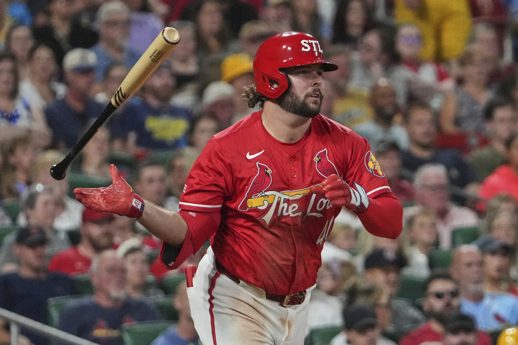 St. Louis Cardinals' Alec Burleson drops his bat after hitting a single during the fifth inning of a baseball game against the Milwaukee Brewers Friday, Sept. 19, 2025, in St. Louis. (AP Photo/Jeff Roberson)