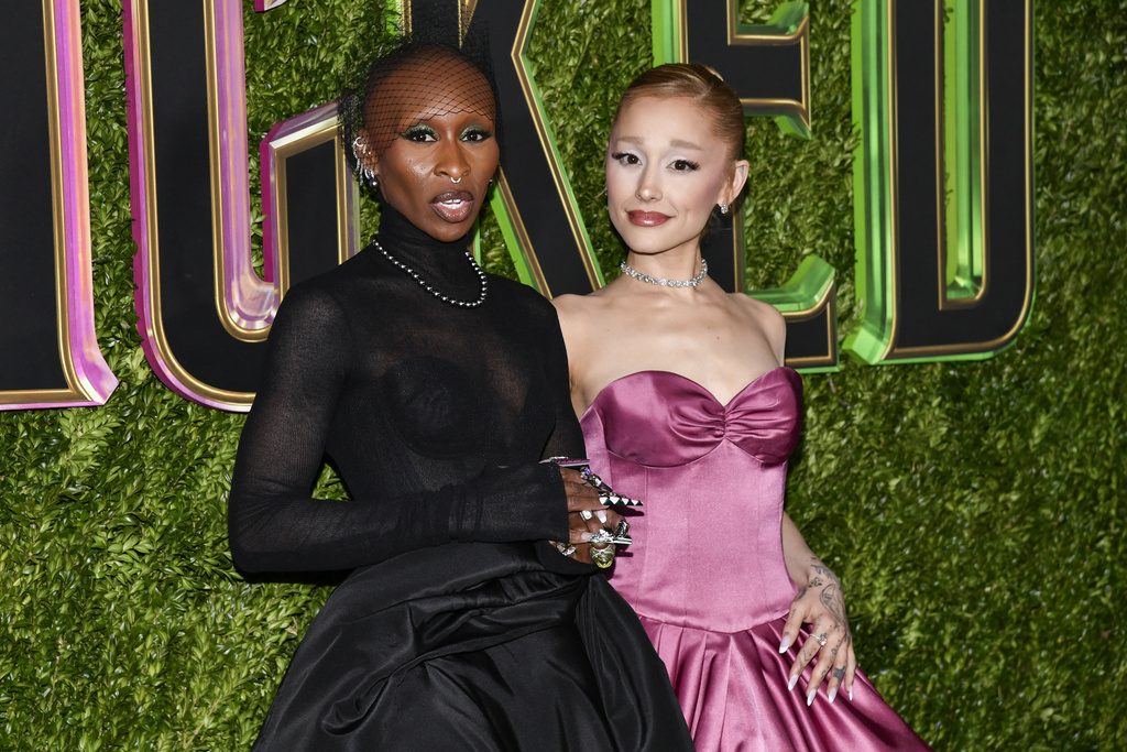 FILE - Cynthia Erivo, left, and Ariana Grande attend the premiere of "Wicked" at the Museum of Modern Art, Nov. 14, 2024, in New York. (Photo by Evan Agostini/Invision/AP, File)
