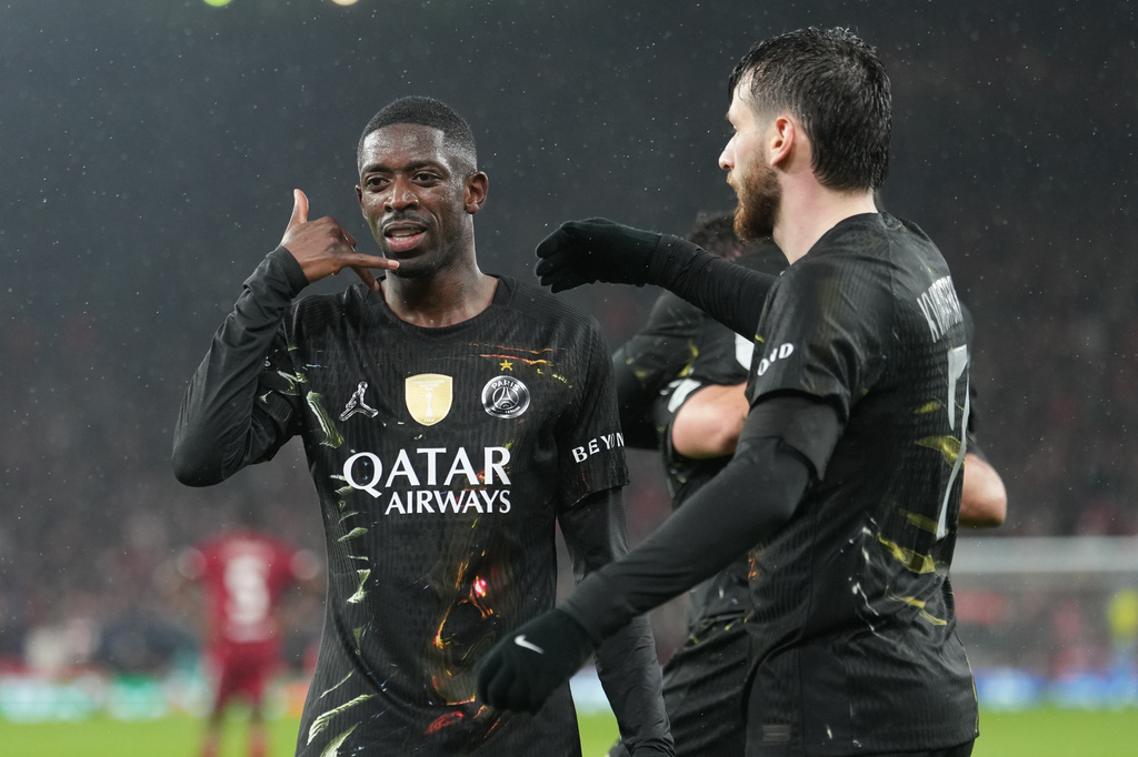 PSG's Ousmane Dembele celebrates after scoring during the Champions League quarterfinal second leg soccer match between Liverpool and Paris Saint-Germain in Liverpool, England, Tuesday, April 14, 2026. (AP Photo/Jon Super)