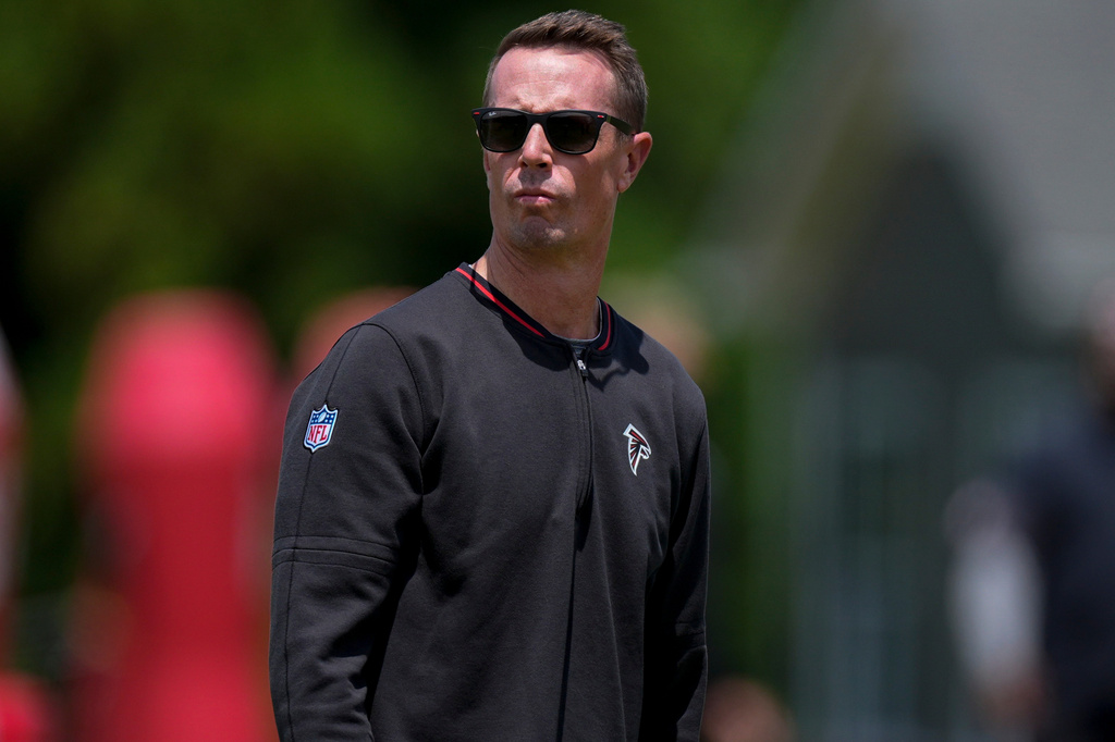 Atlanta Falcon's President of Football, Matt Ryan watches players during an NFL football rookie mini camp, Friday, May 8, 2026, in Flowery Branch, Ga. (AP Photo/Mike Stewart)