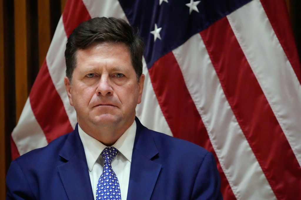 FILE - Jay Clayton, U.S. Attorney for the Southern District of New York, listens during a news conference in New York, March 9, 2026. (AP Photo/Seth Wenig, File)