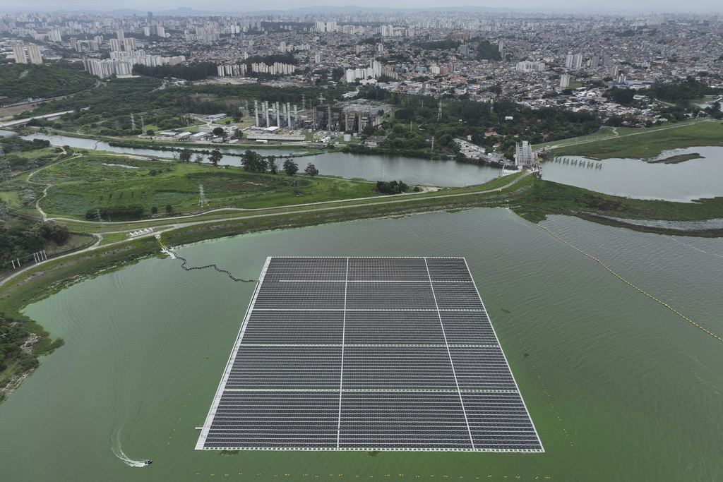 A floating solar farm operates at the Billings Reservoir in Sao Paulo, Thursday, Nov. 6, 2025. (AP Photo/Andre Penner)