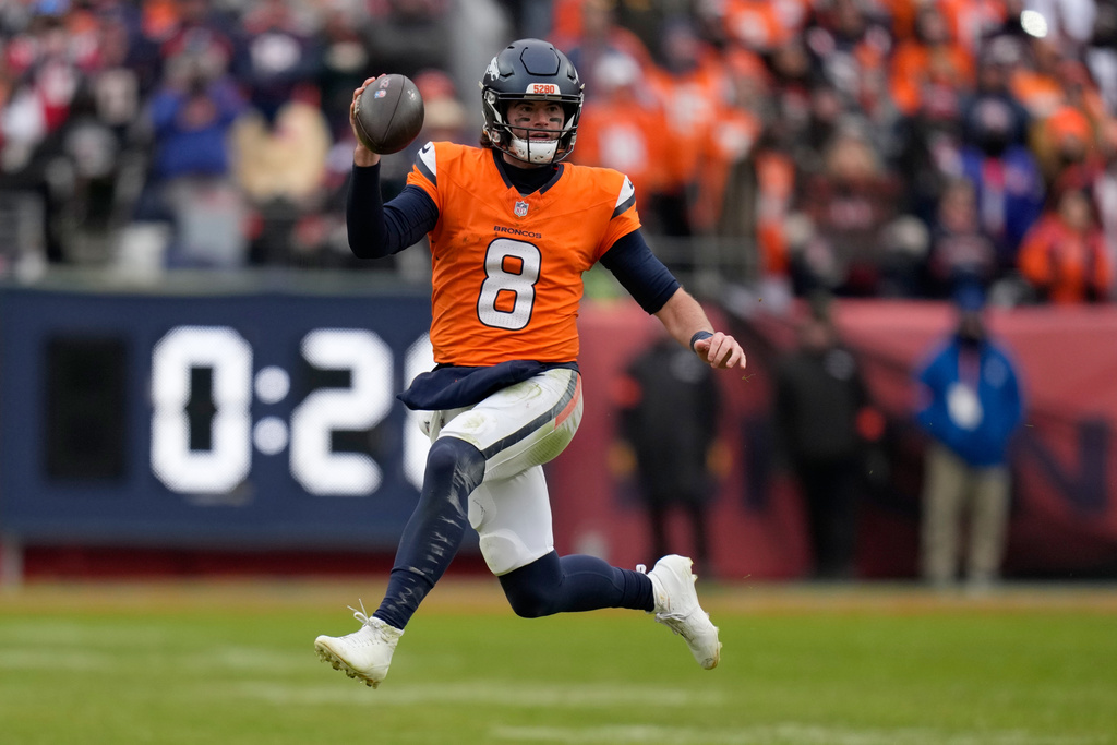 Denver Broncos quarterback Jarrett Stidham New England Patriots during the first the half of the AFC Championship NFL football game, Sunday, Jan. 25, 2026, in Denver. (AP Photo/John Locher)