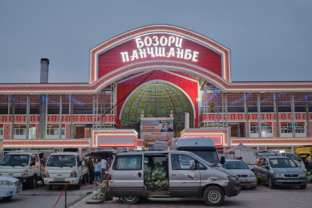 A car filled with cabbages sits parked outside Panjshanbe Bazaar in Khujand, Tajikistan, Saturday, May 2, 2026. (AP Photo/Jon Orbach)